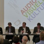 Thomas Frickel, Michael Crone und Christoph Classen auf dem Panelgespraech
